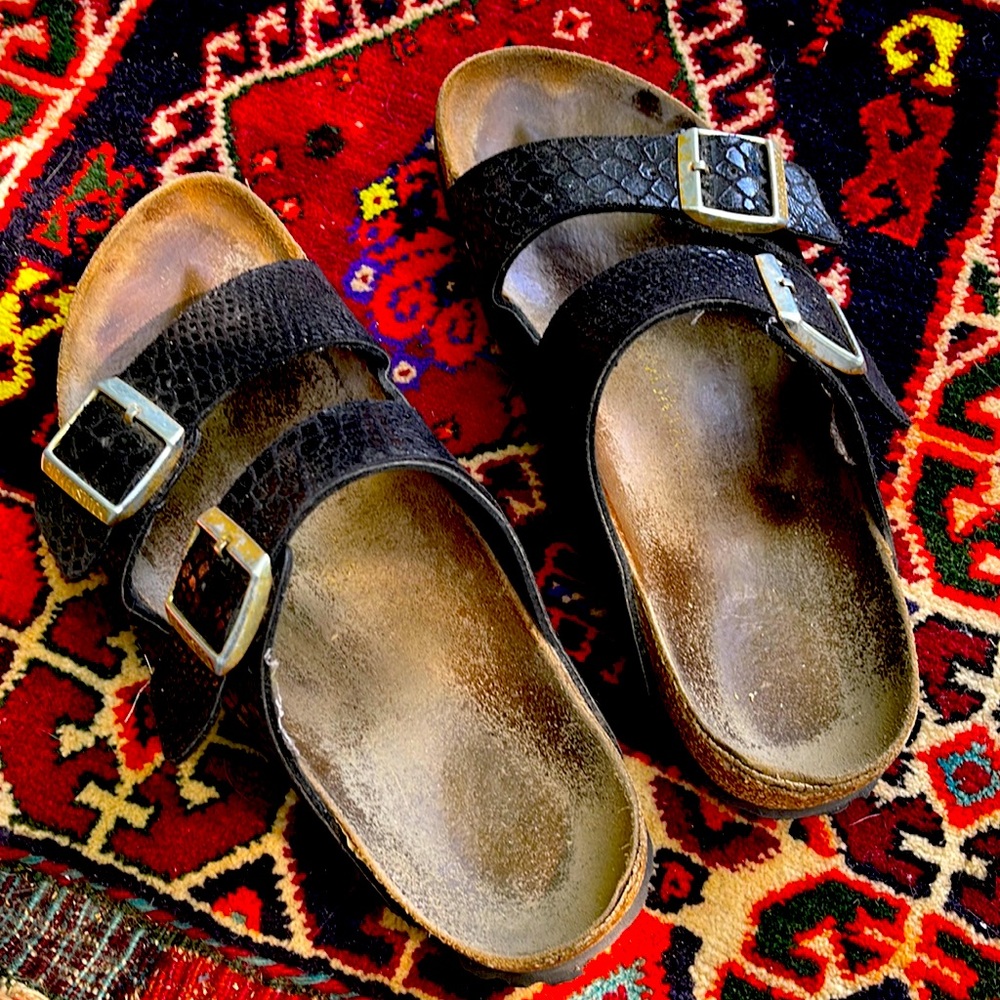 Birkenstock Arizona sandals. Black reptile print size 40 (same as US 9).